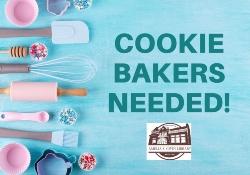 Cookie Bakers Needed - stack of library books