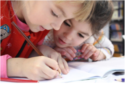 two children coloring