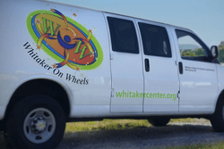 White van with Whitaker on Wheels logo