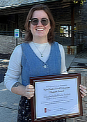 Lizzy Seidel holding her award.